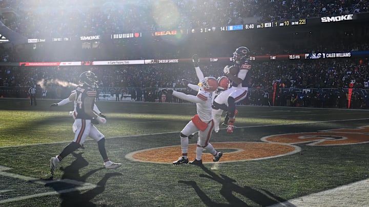 Dec 14, 2025; Chicago, Illinois, USA; Chicago Bears wide receiver DJ Moore (2) catches a pass for a touchdown against Cleveland Browns cornerback Tyson Campbell (7) and Cleveland Browns safety Grant Delpit (9) during the third quarter at Soldier Field. Mandatory Credit: Matt Marton-Imagn Images Dec 14, 2025; Chicago, Illinois, USA; Chicago Bears wide receiver DJ Moore (2) catches a pass for a touchdown against Cleveland Browns cornerback Tyson Campbell (7) and Cleveland Browns safety Grant Delpit (9) during the third quarter at Soldier Field. Mandatory Credit: Matt Marton-Imagn Images