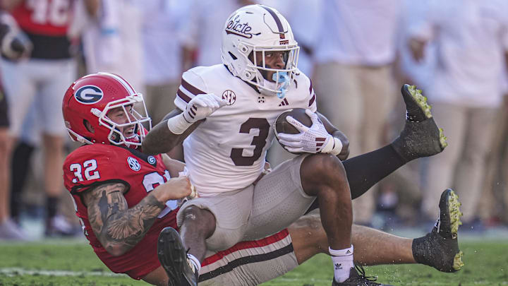 Oct 12, 2024; Athens, Georgia, USA; Georgia Bulldogs linebacker Chaz Chambliss (32) tackles Mississippi State Bulldogs wide receiver Kevin Coleman Jr. (3) at Sanford Stadium. Mandatory Credit: Dale Zanine-Imagn Images