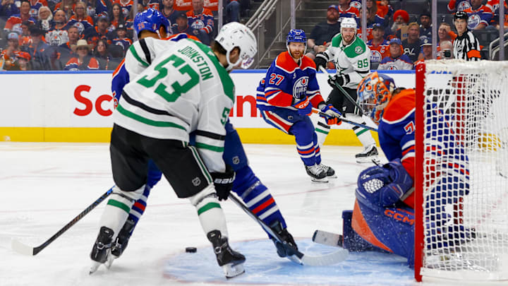 May 27, 2025; Edmonton, Alberta, CAN; Dallas Stars center Wyatt Johnston (53) attempts a shot against Edmonton Oilers goaltender Stuart Skinner (74) during the second period in game four of the Western Conference Final of the 2025 Stanley Cup Playoffs at Rogers Place. Mandatory Credit: Perry Nelson-Imagn Images