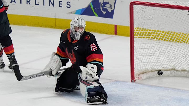 Goalie Philipp Grubauer allows a goal during the Coachella Valley Firebirds win over the Tuscon Roadrunners at Acrisure Arena in Palm Desert, Calif., Feb. 19, 2025.