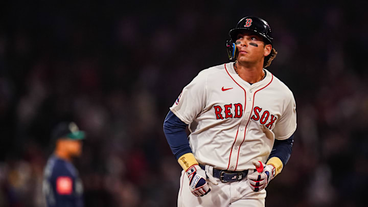 Apr 22, 2025; Boston, Massachusetts, USA; Boston Red Sox first base Triston Casas (36) hits a three run home run against the Seattle Mariners in the seventh inning at Fenway Park. Mandatory Credit: David Butler II-Imagn Images