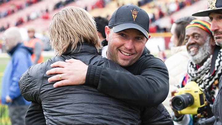 Nov 1, 2025; Ames, Iowa, USA; Arizona State Sun Devils head coach Kenny Dillingham is all smiles after the Sun Devils defeated the Iowa State Cyclones at Jack Trice Stadium. Mandatory Credit: Reese Strickland-Imagn Images