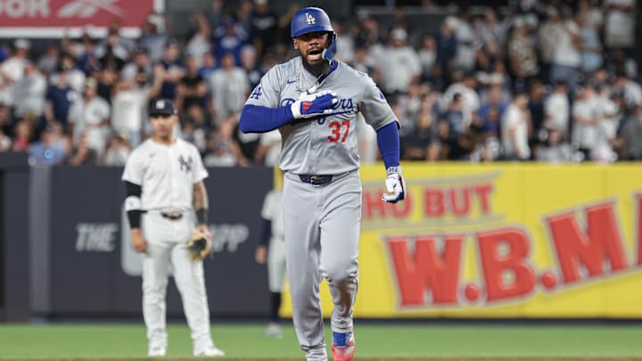 Los Angeles Dodgers right fielder Teoscar Hernandez (37) celebrates while running the bases after his grand slam home run