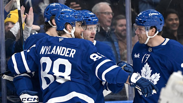 Feb 28, 2026; Toronto, Ontario, CAN;  Toronto Maple Leafs defenseman Morgan Rielly (44) celebrates with team mates after scoring a goal against the Ottawa Senators in the first period at Scotiabank Arena. Mandatory Credit: Dan Hamilton-Imagn Images