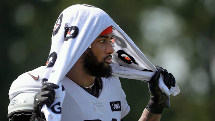 Cleveland Browns cornerback Denzel Ward (21) watches practice from the sideline during NFL training camp at CrossCountry Mortgage Campus, Wednesday, July 30, 2025, in Berea, Ohio. Cleveland Browns cornerback Denzel Ward (21) watches practice from the sideline during NFL training camp at CrossCountry Mortgage Campus, Wednesday, July 30, 2025, in Berea, Ohio.