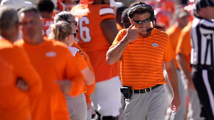 Oklahoma State coach Mike Gundy walks on the sideline during a college football game between the Oklahoma State Cowboys (OSU) and the West Virginia Mountaineers at Boone Pickens Stadium in Stillwater, Okla., Saturday, Oct. 5, 2024. Oklahoma State coach Mike Gundy walks on the sideline during a college football game between the Oklahoma State Cowboys (OSU) and the West Virginia Mountaineers at Boone Pickens Stadium in Stillwater, Okla., Saturday, Oct. 5, 2024.