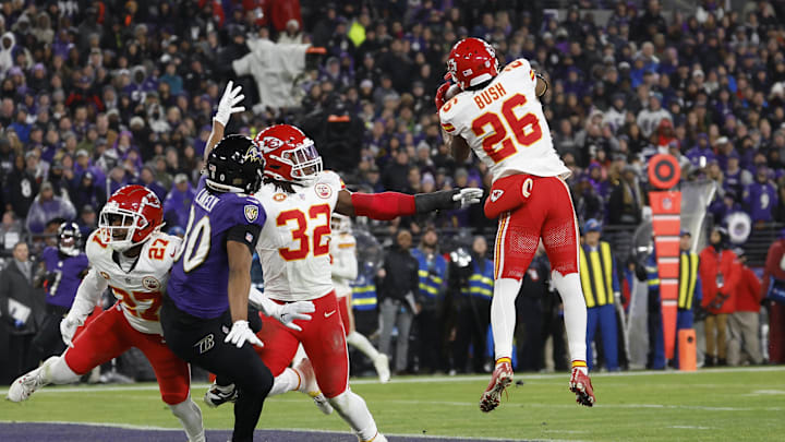 Jan 28, 2024; Baltimore, Maryland, USA; Kansas City Chiefs safety Deon Bush (26) intercepts a pass