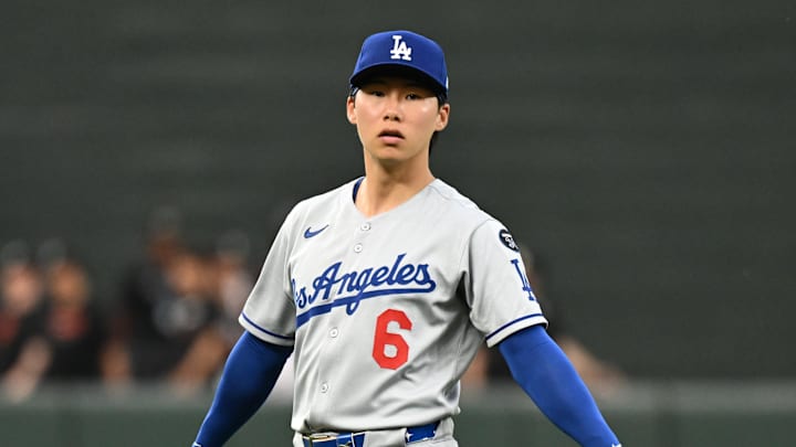 Sep 5, 2025; Baltimore, Maryland, USA; Los Angeles Dodgers second baseman Hyeseong Kim (6) warms up on the field before the game between the Baltimore Orioles and the Los Angeles Dodgers at Oriole Park at Camden Yards. Mandatory Credit: James A. Pittman-Imagn Images Sep 5, 2025; Baltimore, Maryland, USA; Los Angeles Dodgers second baseman Hyeseong Kim (6) warms up on the field before the game between the Baltimore Orioles and the Los Angeles Dodgers at Oriole Park at Camden Yards. Mandatory Credit: James A. Pittman-Imagn Images