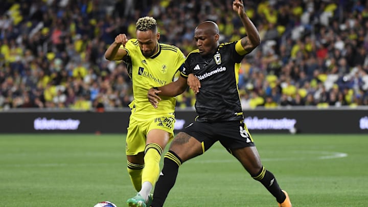 May 28, 2023; Nashville, Tennessee, USA; Columbus Crew midfielder Darlington Nagbe (6) fights for