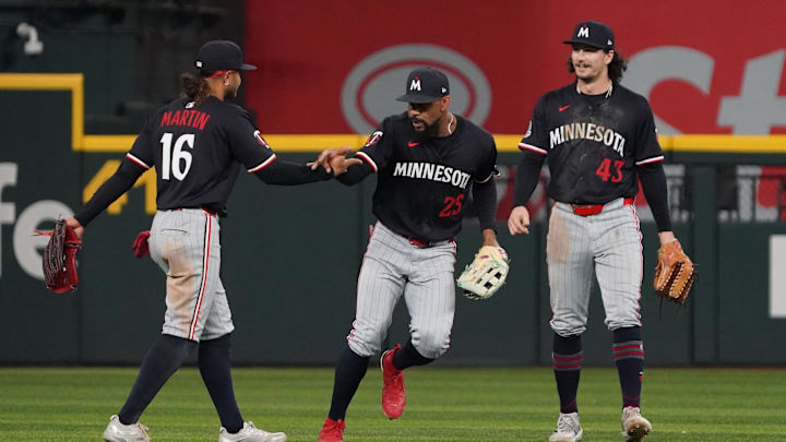 Sep 23, 2025; Arlington, Texas, USA; Minnesota Twins outfielder Austin Martin (16), Minnesota Twins outfielder Byron Buxton (25) and outfielder James Outman (43) react after the game against the Texas Rangers at Globe Life Field. Mandatory Credit: Raymond Carlin III-Imagn Images Sep 23, 2025; Arlington, Texas, USA; Minnesota Twins outfielder Austin Martin (16), Minnesota Twins outfielder Byron Buxton (25) and outfielder James Outman (43) react after the game against the Texas Rangers at Globe Life Field. Mandatory Credit: Raymond Carlin III-Imagn Images