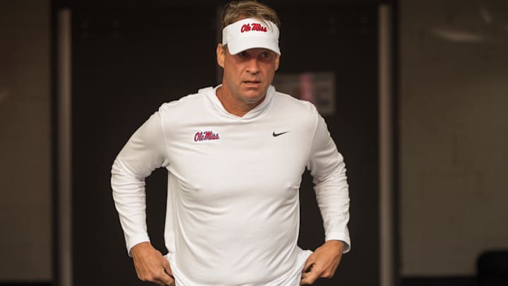 Oct 12, 2024; Baton Rouge, Louisiana, USA; Mississippi Rebels head coach Lane Kiffin takes the field before a game against the LSU Tigers at Tiger Stadium. Mandatory Credit: Stephen Lew-Imagn Images