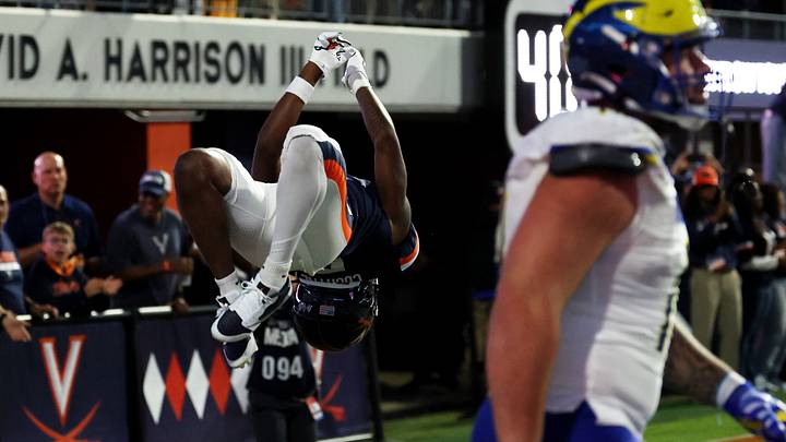 Sep 26, 2026; Charlottesville, Virginia, USA; Virginia Cavaliers wide receiver Kameron Courtney (5) celebrates with a back flip in the end zone after scoring a touchdown against the Delaware Blue Hens during the first half at Scott Stadium. Mandatory Credit: Geoff Burke-Imagn Images Sep 26, 2026; Charlottesville, Virginia, USA; Virginia Cavaliers wide receiver Kameron Courtney (5) celebrates with a back flip in the end zone after scoring a touchdown against the Delaware Blue Hens during the first half at Scott Stadium. Mandatory Credit: Geoff Burke-Imagn Images