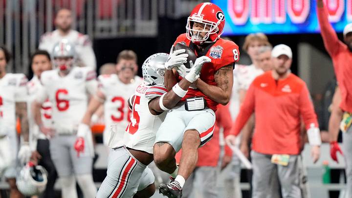 Dec 31, 2022; Atlanta, Georgia, USA; Ohio State Buckeyes safety Tanner McCalister (15) tackles Georgia Bulldogs wide receiver Dominick Blaylock (8) after a catch during the first quarter of the Peach Bowl in the College Football Playoff semifinal at Mercedes-Benz Stadium.

Osu22uga Kwr 19

Syndication The Columbus Dispatch
