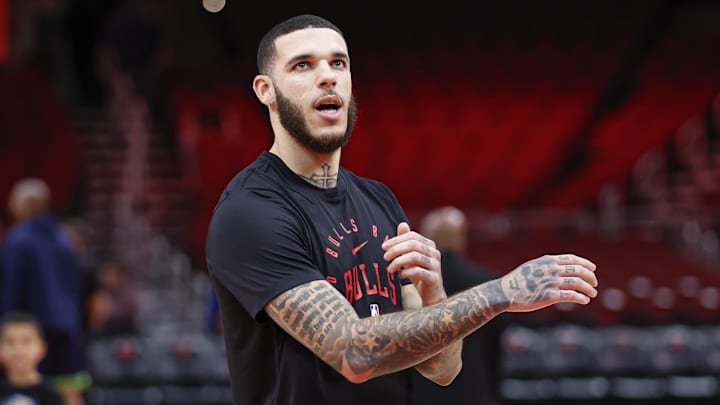 Chicago Bulls guard Lonzo Ball (2) warms up before an NBA game against the Minnesota Timberwolves at United Center. Mandatory Credit: Kamil Krzaczynski-Imagn Images