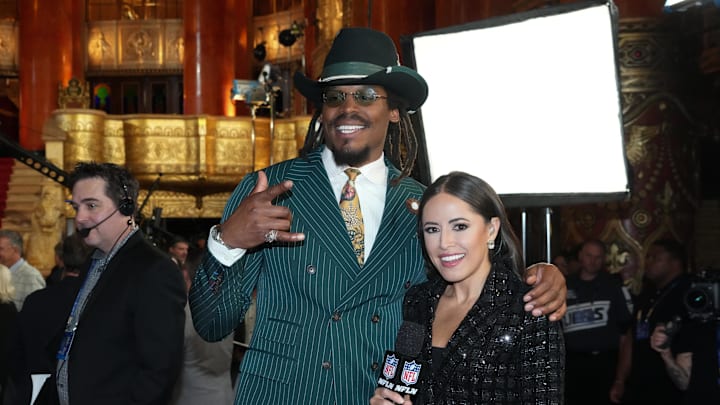 Apr 25, 2024; Detroit, MI, USA; Former NFL quarterback Cam Newton and broadcaster Kaylee Hartung pose for a photograph on the red carpet ahead of the 2024 NFL Draft at Detroit’s Fox Theatre. Mandatory Credit: Kirby Lee-Imagn Images