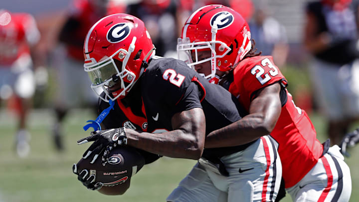 Georgia wide receiver Nitro Tuggle (2) catches a pass from Georgia quarterback Gunner Stockton (14) during the G-Day spring football game in Athens, Ga., on Saturday, April 13, 2024. The game ended in a tie.