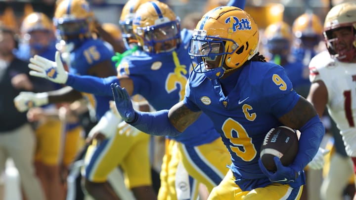 Oct 4, 2025; Pittsburgh, Pennsylvania, USA; Pittsburgh Panthers linebacker Kyle Louis (9) runs after fumble recovery against the Boston College Eagles during the second quarter at Acrisure Stadium. Mandatory Credit: Charles LeClaire-Imagn Images Oct 4, 2025; Pittsburgh, Pennsylvania, USA; Pittsburgh Panthers linebacker Kyle Louis (9) runs after fumble recovery against the Boston College Eagles during the second quarter at Acrisure Stadium. Mandatory Credit: Charles LeClaire-Imagn Images