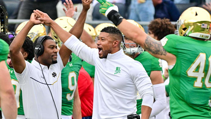 Sep 28, 2024; South Bend, Indiana, USA; Notre Dame Fighting Irish head coach Marcus Freeman reacts after a turnover on downs by the Louisville Cardinals in the second quarter at Notre Dame Stadium. 