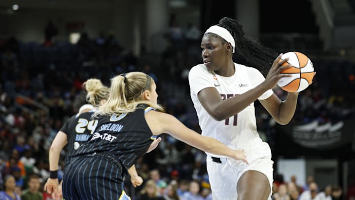 Apr 29, 2026; Chicago, IL, USA; Atlanta Dream center Madina
Okot (11) drives to the basket against Chicago Sky guard Jacy Sheldon (0) during the second half of a WNBA preseason game at Wintrust Arena. Mandatory Credit: Kamil Krzaczynski-Imagn Images