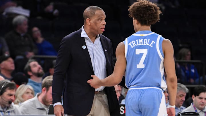 UNC basketball head coach Hubert Davis and guard Seth Trimble