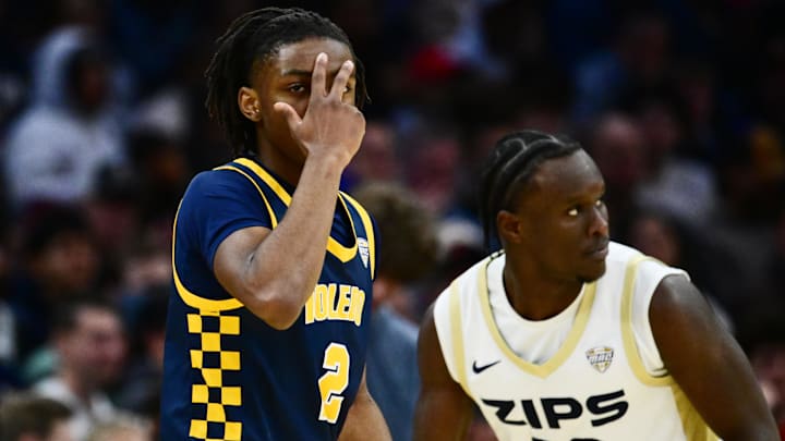 Mar 14, 2026; Cleveland, OH, USA; Toledo Rockets guard Leroy Blyden Jr. (2) celebrates after hitting a three point basket against the Akron Zips during the first half of the men’s Mid-American Conference Championship at Rocket Arena. Mandatory Credit: Ken Blaze-Imagn Images