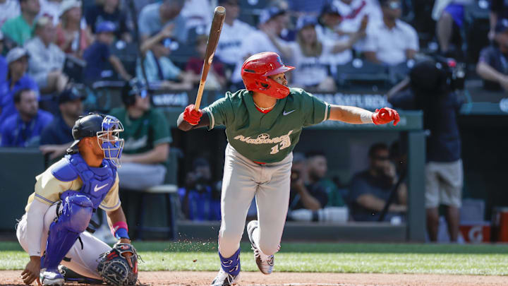 Jul 8, 2023; Seattle, Washington, USA; National League Futures designated hitter Justin Crawford (13) of the Philadelphia Phillies hits an RBI-sacrifice fly against the American League Futures during the second inning of the All Star-Futures Game at T-Mobile Park. 