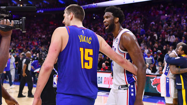 Jan 28, 2023; Philadelphia, Pennsylvania, USA; Denver Nuggets center Nikola Jokic (15) and Philadelphia 76ers center Joel Embiid (21) meet after a game at Wells Fargo Center. Mandatory Credit: Kyle Ross-Imagn Images
