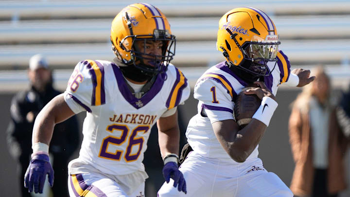 Dec 6, 2024; Birmingham, AL, USA; Jackson's Landon Duckworth (1) runs the ball against Cherokee County at Protective Stadium in the AHSAA 4A State Championship game.