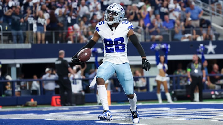 Dallas Cowboys CB DaRon Bland reacts after returning an interception for a touchdown against the New England Patriots. Dallas Cowboys CB DaRon Bland reacts after returning an interception for a touchdown against the New England Patriots.