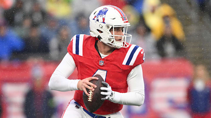 Dec 3, 2023; Foxborough, Massachusetts, USA; New England Patriots quarterback Bailey Zappe (4) looks to throw against the Los Angeles Chargers during the first half at Gillette Stadium. Mandatory Credit: Brian Fluharty-Imagn Images