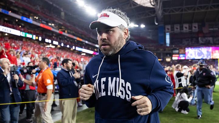 Mississippi Rebels head coach Pete Golding against the Miami Hurricanes during the 2026 Fiesta Bowl and semifinal game of the College Football Playoff. Mississippi Rebels head coach Pete Golding against the Miami Hurricanes during the 2026 Fiesta Bowl and semifinal game of the College Football Playoff.
