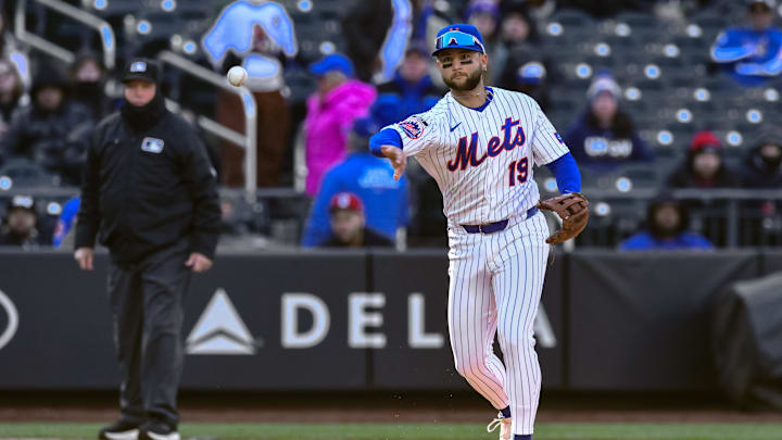 Apr 8, 2026; New York City, New York, USA; New York Mets shortstop Bo Bichette (19) fields a ground ball hit by Arizona Diamondbacks left fielder Jorge Barrosa (not pictured) and throws to first base for an out during the fourth inning at Citi Field. Mandatory Credit: John Jones-Imagn Images