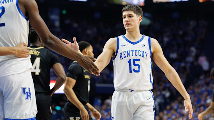 Mar 6, 2024; Lexington, Kentucky, USA; Kentucky Wildcats guard Reed Sheppard (15) fives forward Aaron Bradshaw (2) during the first half against the Vanderbilt Commodores at Rupp Arena at Central Bank Center. Mandatory Credit: Jordan Prather-USA TODAY Sports