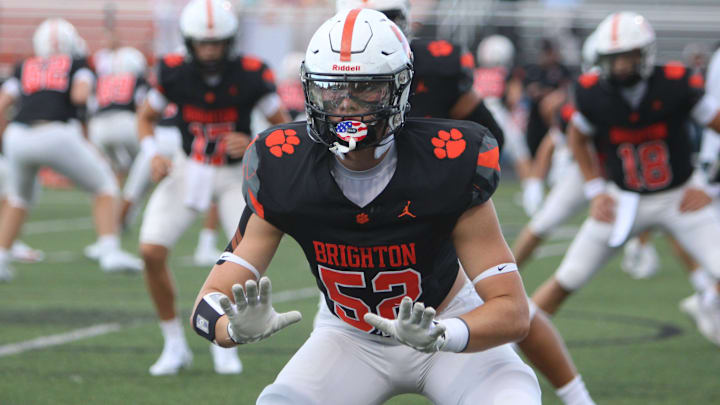 Offensive lineman Jack Carlson of Brighton warms up before a season-opening football game against Dexter on Thursday, Aug. 28, 2025 at Brighton. Offensive lineman Jack Carlson of Brighton warms up before a season-opening football game against Dexter on Thursday, Aug. 28, 2025 at Brighton.