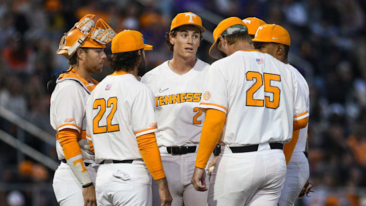 Tennessee head baseball coach Tony Vitello visits Chris Stamos (27) at the pound during a NCAA