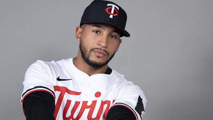 Feb 21, 2025; Fort Myers, FL, USA;  Minnesota Twins outfielder Emmanuel Rodriguez (32) takes photos during media day. 