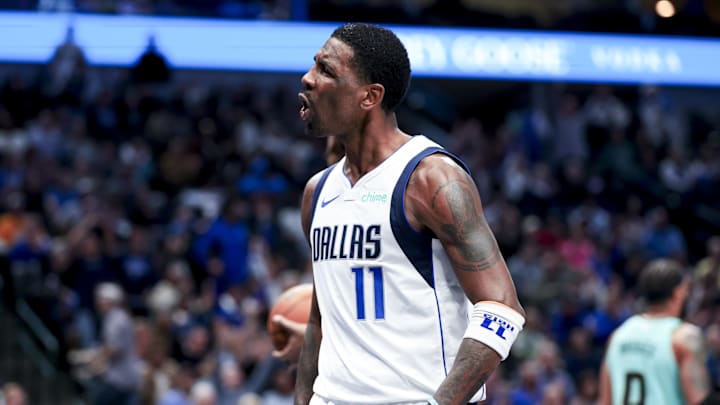 Feb 27, 2025; Dallas, Texas, USA;  Dallas Mavericks guard Kyrie Irving (11) reacts after scoring against the Charlotte Hornets during the second half at American Airlines Center. Mandatory Credit: Kevin Jairaj-Imagn Images