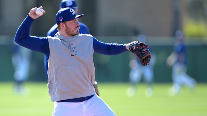 Feb 17, 2024; Glendale, AZ, USA;  Los Angeles Dodgers shortstop Gavin Lux (9) fields balls during