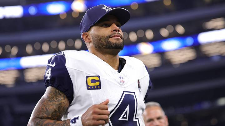 Dallas Cowboys quarterback Dak Prescott (4) jogs off the field after a game against the Washington Commanders at AT&T Stadium. Dallas Cowboys quarterback Dak Prescott (4) jogs off the field after a game against the Washington Commanders at AT&T Stadium.