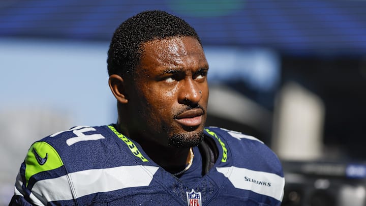 Oct 6, 2024; Seattle, Washington, USA; Seattle Seahawks wide receiver DK Metcalf (14) walks to the locker room following pregame warmups against the New York Giants at Lumen Field. Mandatory Credit: Joe Nicholson-Imagn Images