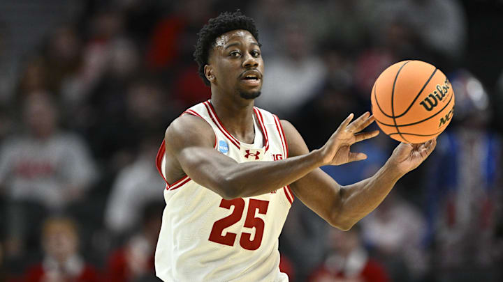 Mar 19, 2026; Portland, OR, USA; Wisconsin Badgers guard John Blackwell (25) passes against the High Point Panthers during the first half of a first round game of the men's 2026 NCAA Tournament at Moda Center. Mandatory Credit: Craig Strobeck-Imagn Images Mar 19, 2026; Portland, OR, USA; Wisconsin Badgers guard John Blackwell (25) passes against the High Point Panthers during the first half of a first round game of the men's 2026 NCAA Tournament at Moda Center. Mandatory Credit: Craig Strobeck-Imagn Images
