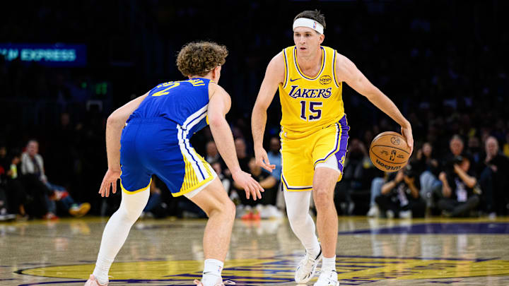 Oct 21, 2025; Los Angeles, California, USA; Los Angeles Lakers guard Austin Reaves (15) dribbles against Golden State Warriors guard Brandin Podziemski (2) during the first half at Crypto.com Arena. Mandatory Credit: William Liang-Imagn Images Oct 21, 2025; Los Angeles, California, USA; Los Angeles Lakers guard Austin Reaves (15) dribbles against Golden State Warriors guard Brandin Podziemski (2) during the first half at Crypto.com Arena. Mandatory Credit: William Liang-Imagn Images