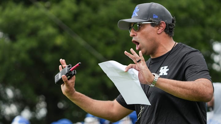 New Kentucky offensive coordinator Bush Hamdan coaches during practice Friday. August 2, 2024 in Lexington. Hamdan came from Boise State; he's also coached at Missouri, the Atlanta Falcons and Florida as well.