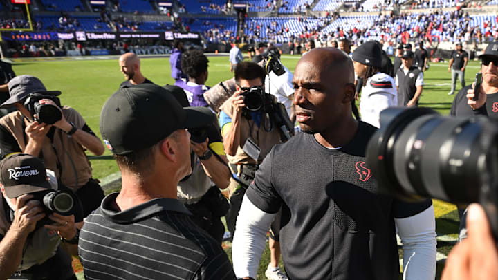 Oct 5, 2025; Baltimore, Maryland, USA; Baltimore Ravens head coach John Harbaugh and Houston Texans head coach Demeco Ryans shake hands after a game between the Houston Texans and the Baltimore Ravens at M&T Bank Stadium. Mandatory Credit: Rafael Suanes-Imagn Images