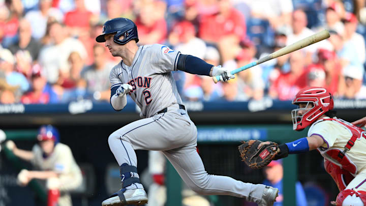 Aug 28, 2024; Philadelphia, Pennsylvania, USA; Houston Astros infielder Alex Bregman (2) hits a single against the Philadelphia Phillies in the third inning at Citizens Bank Park.