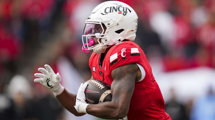 Oct 25, 2025; Cincinnati, Ohio, USA;  Cincinnati Bearcats running back Evan Pryor (6) runs with the ball against the Baylor Bears in the first half at Nippert Stadium. Mandatory Credit: Aaron Doster-Imagn Images