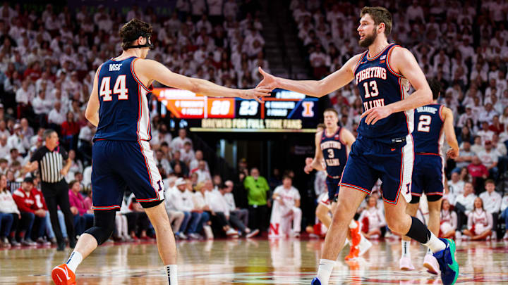 Feb 1, 2026; Lincoln, Nebraska, USA; Illinois Fighting Illini center Tomislav Ivisic (13) and center Zvonimir Ivisic (44) celebrate after a shot in the first half against the Nebraska Cornhuskers at Pinnacle Bank Arena. Mandatory Credit: Dylan Widger-Imagn Images