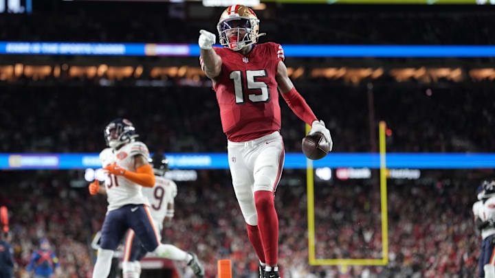San Francisco 49ers wide receiver Jauan Jennings (15) runs to score a touchdown 