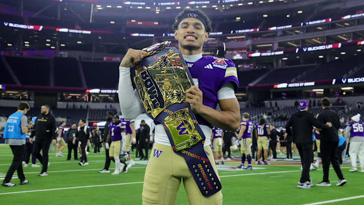 Washington quarterback Demond Williams Jr. poses with the belt he received after winning Offensive MVP at the 2025 Bucked Up LA Bowl Hosted By Gronk, where his Huskies defeated the Boise State Broncos by a score of 38-10.