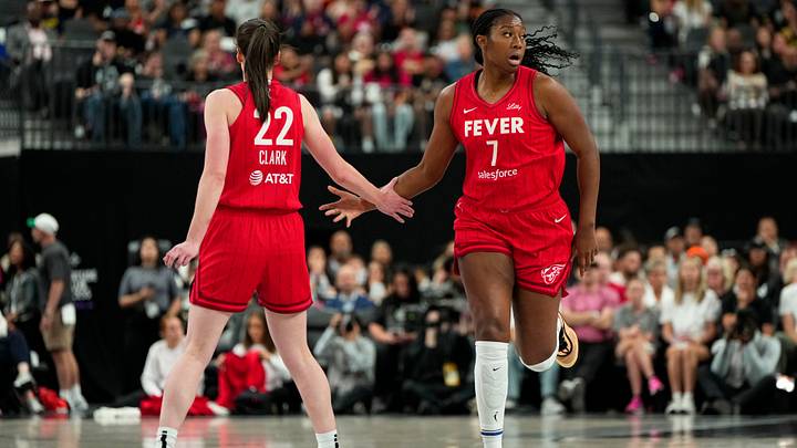 Jun 22, 2025; Las Vegas, Nevada, USA; Indiana Fever center Aliyah Boston (7) celebrates with guard Caitlin Clark (22) after scoring against the Las Vegas Aces during the first half of a WNBA basketball game at T-Mobile Arena. Mandatory Credit: Lucas Peltier-Imagn Images Jun 22, 2025; Las Vegas, Nevada, USA; Indiana Fever center Aliyah Boston (7) celebrates with guard Caitlin Clark (22) after scoring against the Las Vegas Aces during the first half of a WNBA basketball game at T-Mobile Arena. Mandatory Credit: Lucas Peltier-Imagn Images